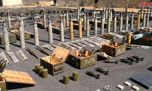armas halladas en escondites terroristas en el sur de Siria Hallan enormes cantidades de armas en escondites terroristas en el sur de Siria